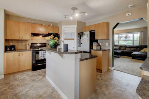 469 Morningside Way Sw, Airdrie, AB - Indoor Photo Showing Kitchen