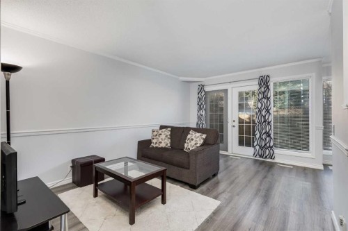 3-93 Grier Place Ne, Calgary, AB - Indoor Photo Showing Living Room