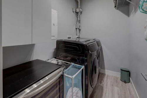 403-1441 23 Avenue Sw, Calgary, AB - Indoor Photo Showing Laundry Room