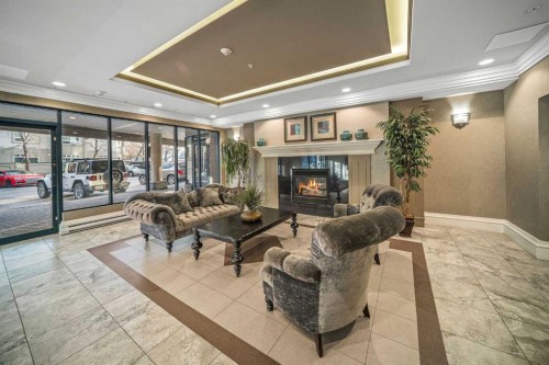 401-4 14 Street Nw, Calgary, AB - Indoor With Fireplace