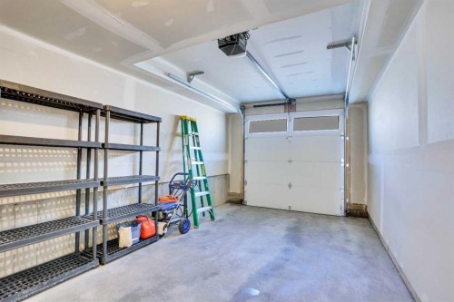 19 Royal Elm Green Nw, Calgary, AB - Indoor Photo Showing Garage
