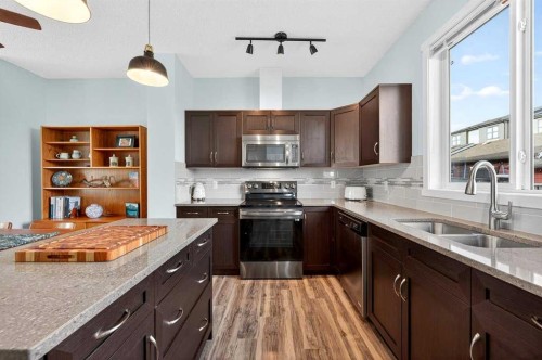 82 Mahogany Drive Se, Calgary, AB - Indoor Photo Showing Kitchen With Double Sink