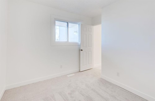 1310-13104 Elbow Drive Sw, Calgary, AB - Indoor Photo Showing Other Room