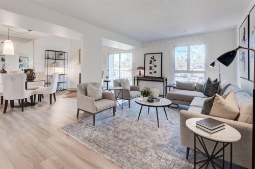 1310-13104 Elbow Drive Sw, Calgary, AB - Indoor Photo Showing Living Room