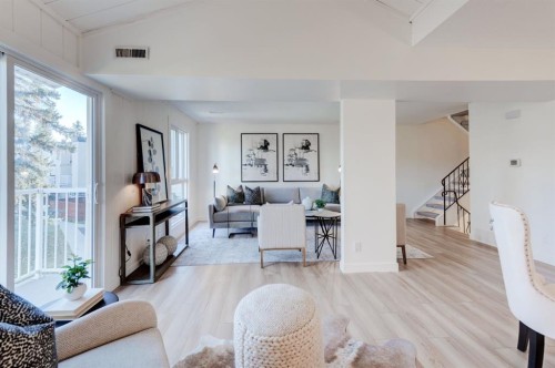 1310-13104 Elbow Drive Sw, Calgary, AB - Indoor Photo Showing Living Room