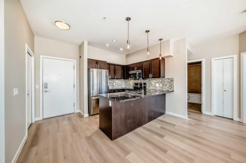 201-4303 1 Street Ne, Calgary, AB - Indoor Photo Showing Kitchen With Stainless Steel Kitchen