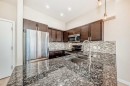 201-4303 1 Street Ne, Calgary, AB  - Indoor Photo Showing Kitchen With Stainless Steel Kitchen With Double Sink With Upgraded Kitchen 