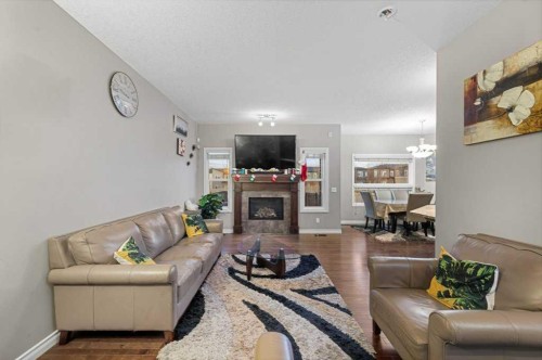 187 Sage Hill Green Nw, Calgary, AB - Indoor Photo Showing Living Room With Fireplace