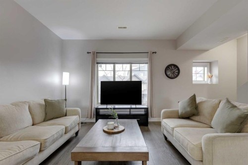 1404-121 Copperpond Common Se, Calgary, AB - Indoor Photo Showing Living Room