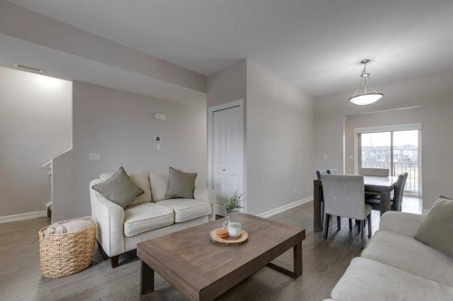 1404-121 Copperpond Common Se, Calgary, AB - Indoor Photo Showing Living Room