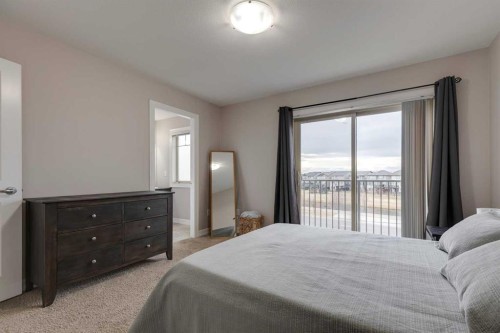 1404-121 Copperpond Common Se, Calgary, AB - Indoor Photo Showing Bedroom