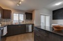 1404-121 Copperpond Common Se, Calgary, AB  - Indoor Photo Showing Kitchen With Stainless Steel Kitchen With Upgraded Kitchen 
