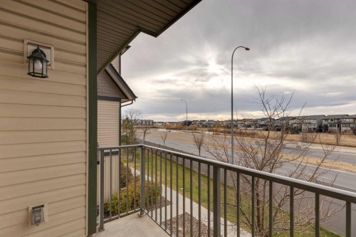 1404-121 Copperpond Common Se, Calgary, AB - Outdoor With Balcony With Exterior