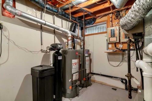 223 Shawnee Mews Sw, Calgary, AB - Indoor Photo Showing Basement