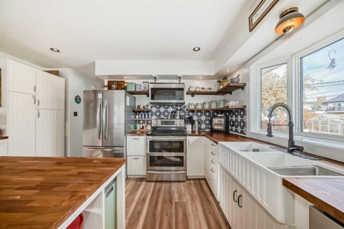 2155 Mackid Crescent Ne, Calgary, AB - Indoor Photo Showing Kitchen With Double Sink With Upgraded Kitchen