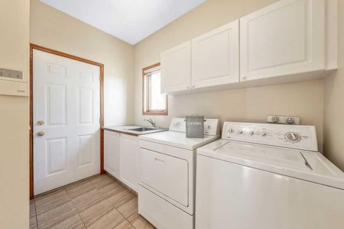 109 Lakeside Greens, Chestermere, AB - Indoor Photo Showing Laundry Room