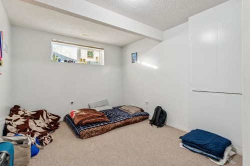 8454 Saddleridge Drive Ne, Calgary, AB - Indoor Photo Showing Bedroom