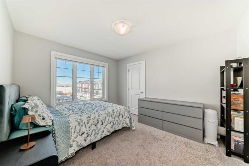 1409 Sage Hill Grove Nw, Calgary, AB - Indoor Photo Showing Bedroom