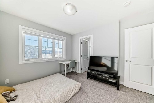 1409 Sage Hill Grove Nw, Calgary, AB - Indoor Photo Showing Bedroom