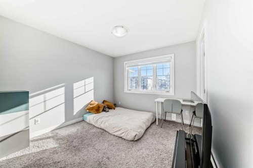 1409 Sage Hill Grove Nw, Calgary, AB - Indoor Photo Showing Bedroom