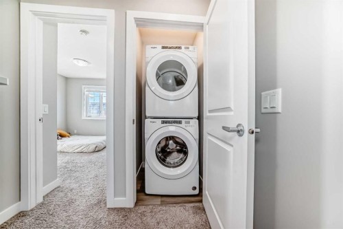 1409 Sage Hill Grove Nw, Calgary, AB - Indoor Photo Showing Laundry Room