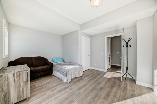 1409 Sage Hill Grove Nw, Calgary, AB - Indoor Photo Showing Bedroom