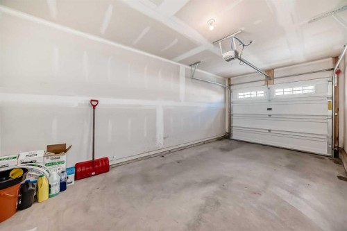 1409 Sage Hill Grove Nw, Calgary, AB - Indoor Photo Showing Garage