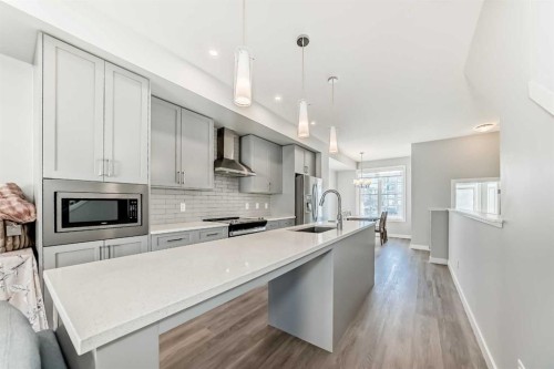 1409 Sage Hill Grove Nw, Calgary, AB - Indoor Photo Showing Kitchen With Upgraded Kitchen