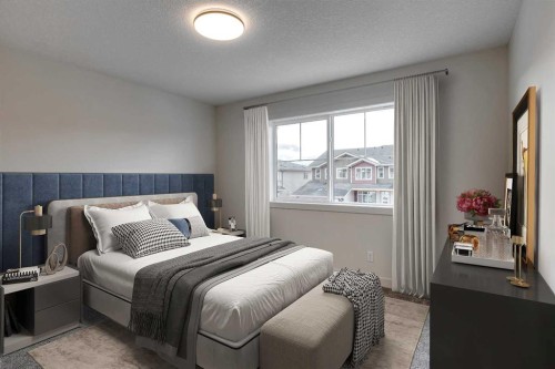 16 Sundown Place, Cochrane, AB - Indoor Photo Showing Bedroom