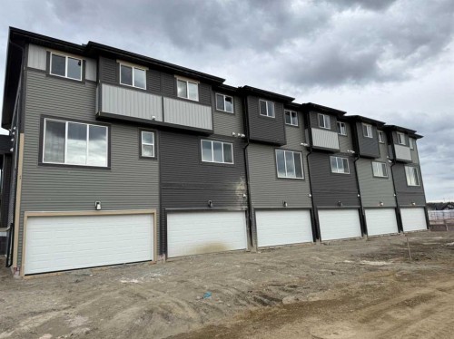 16 Sundown Place, Cochrane, AB - Outdoor With Exterior