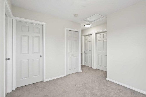 21-102 Canoe Square Sw, Airdrie, AB - Indoor Photo Showing Other Room