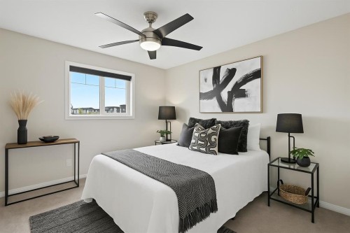 21-102 Canoe Square Sw, Airdrie, AB - Indoor Photo Showing Bedroom