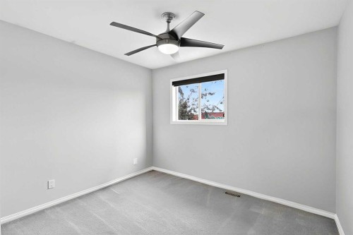 21-102 Canoe Square Sw, Airdrie, AB - Indoor Photo Showing Other Room