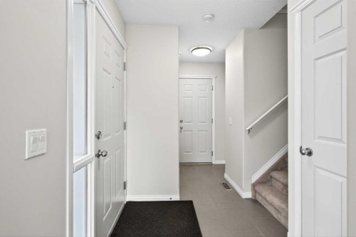 21-102 Canoe Square Sw, Airdrie, AB - Indoor Photo Showing Other Room