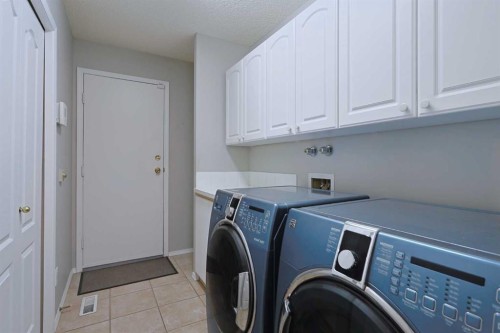 220 Silver Creek Mews Nw, Calgary, AB - Indoor Photo Showing Laundry Room