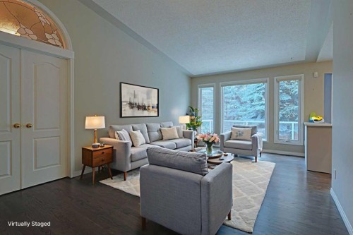 220 Silver Creek Mews Nw, Calgary, AB - Indoor Photo Showing Living Room