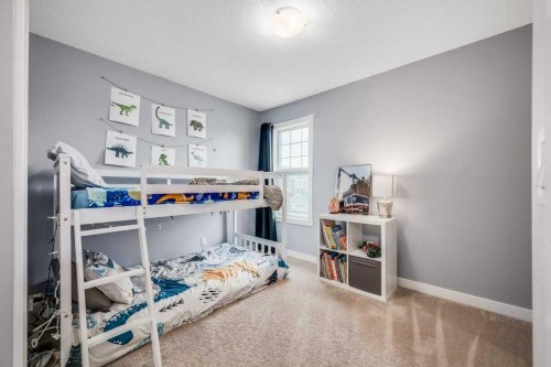 29 Legacy Mews Se, Calgary, AB - Indoor Photo Showing Bedroom