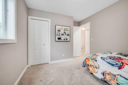 29 Legacy Mews Se, Calgary, AB - Indoor Photo Showing Bedroom