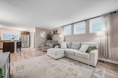 29 Legacy Mews Se, Calgary, AB - Indoor Photo Showing Living Room