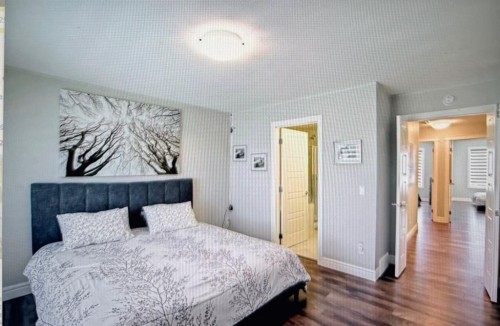 10077 46 Street Ne, Calgary, AB - Indoor Photo Showing Bedroom