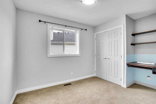 208 Sagewood Landing Sw, Airdrie, AB - Indoor Photo Showing Other Room