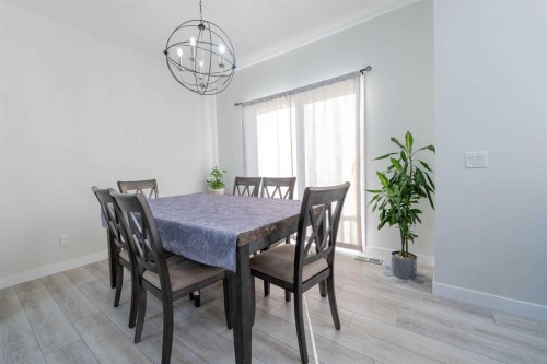 15 Midgrove Drive Sw, Airdrie, AB - Indoor Photo Showing Dining Room