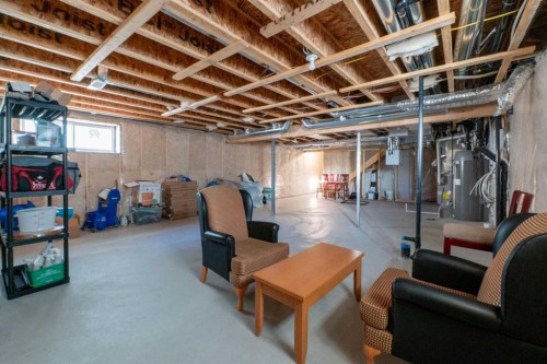 15 Midgrove Drive Sw, Airdrie, AB - Indoor Photo Showing Basement