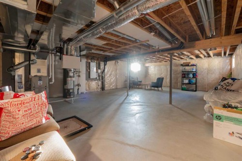 15 Midgrove Drive Sw, Airdrie, AB - Indoor Photo Showing Basement