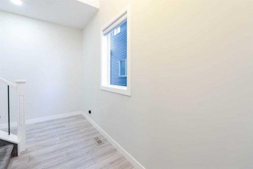15 Midgrove Drive Sw, Airdrie, AB - Indoor Photo Showing Other Room