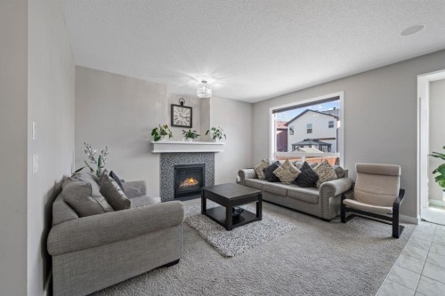 514 Skyview Ranch Way Ne, Calgary, AB - Indoor Photo Showing Living Room With Fireplace