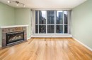 1805-650 10 Street Sw, Calgary, AB  - Indoor Photo Showing Living Room With Fireplace 