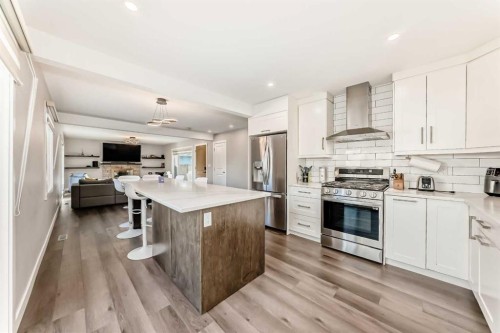 9816 Palistone Road Sw, Calgary, AB - Indoor Photo Showing Kitchen With Stainless Steel Kitchen With Upgraded Kitchen