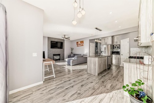 216 Saddlecrest Way Ne, Calgary, AB - Indoor With Fireplace