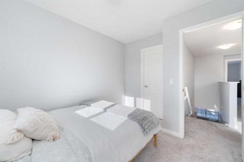 108 Masters Heights Se, Calgary, AB - Indoor Photo Showing Bedroom